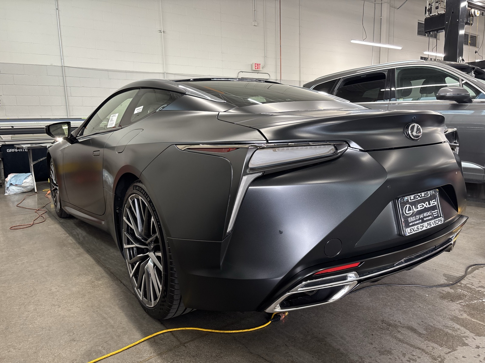 Lexus LC with matte paint protection film, rear three-quarter view
