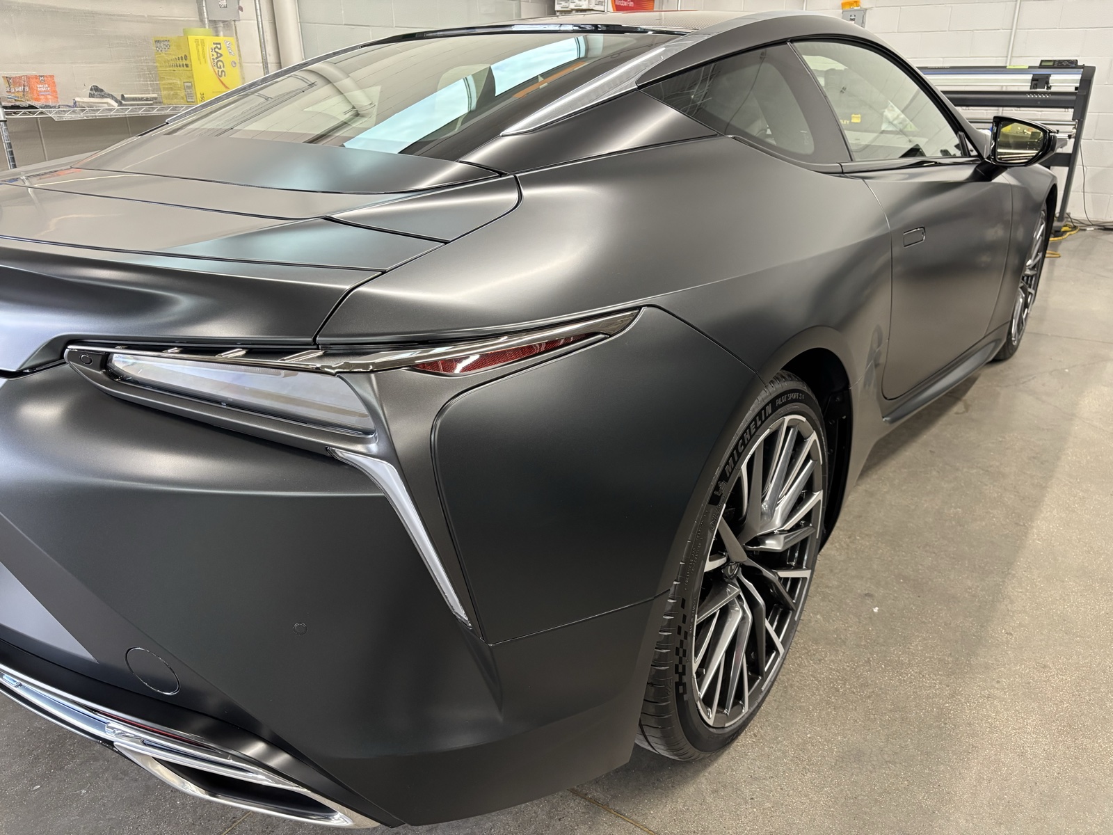 Lexus LC with matte paint protection film, side view from the rear